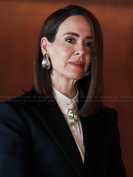 Carr's silver tear drop earrings on Alls Fair