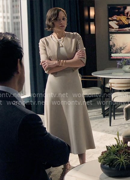 Celine’s beige midi dress with cropped leather jacket on The Morning Show