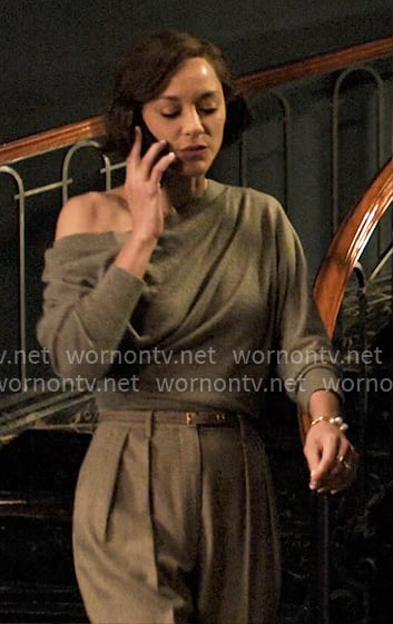 Celine’s grey one-shoulder sweater on The Morning Show