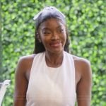 Chelsea’s white halter neck dress on Selling Sunset