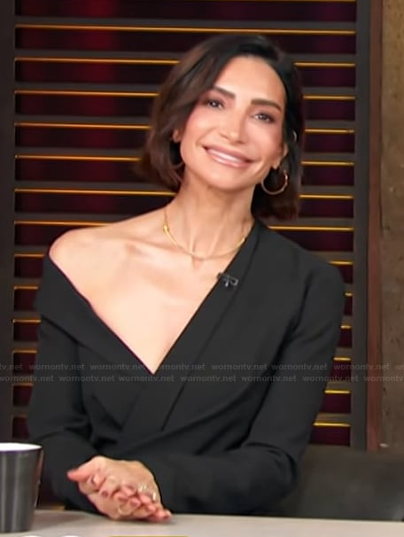 Courtney Lopez's black one shoulder dress on Access Hollywood