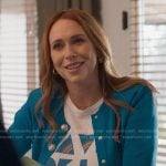 Maddie’s white graphic tee and blue cardigan on 9-1-1