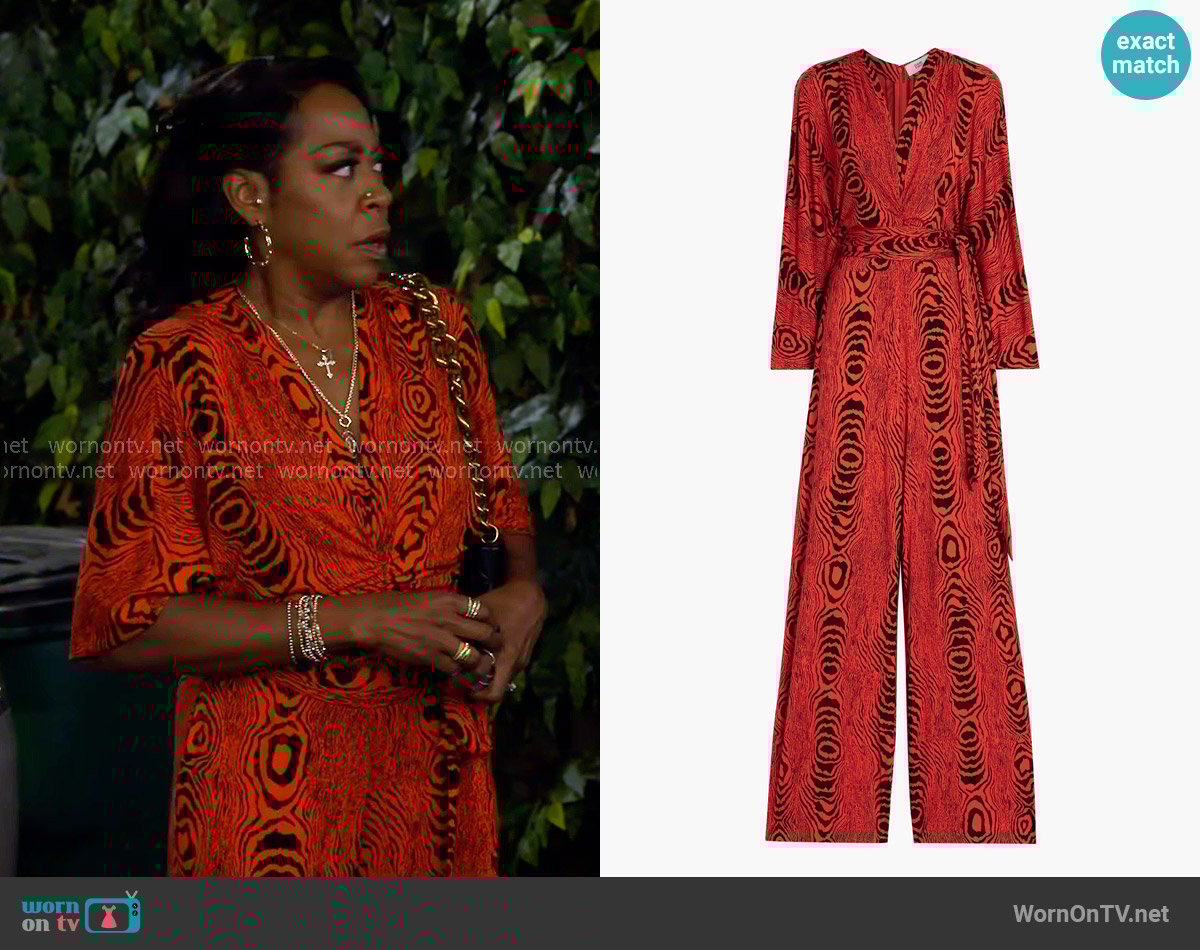 Diane von Furstenberg Aurelia Jumpsuit in Wood Grain Red worn by Tina Butler (Tichina Arnold) on The Neighborhood