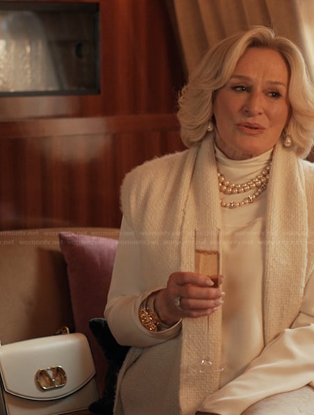 Dina's white leather bag on Alls Fair