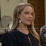Donna’s navy puff-sleeve keyhole top on The Bold and the Beautiful