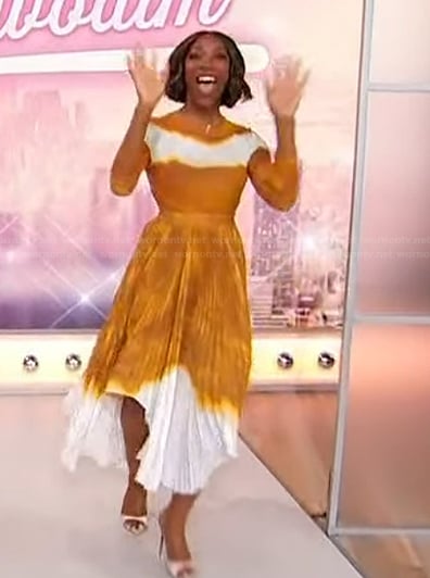 Ego Nwodim's yellow tie dye top and skirt on Sherri