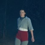 El’s white high cut sneakers on Stranger Things