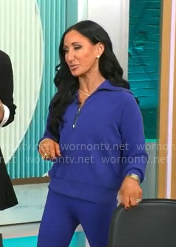 Elizabeth Werner's blue leggings and sweatshirt on CBS Mornings