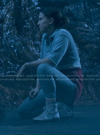 El’s white high cut sneakers on Stranger Things