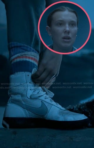 El’s white high cut sneakers on Stranger Things