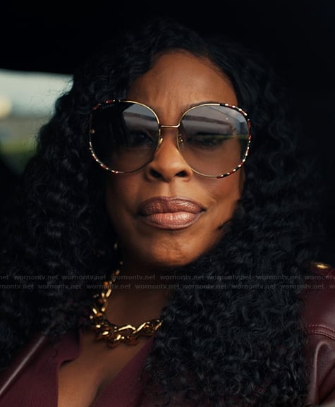 Emerald's round sunglasses on Alls Fair