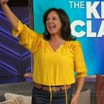 Emily Kaufman’s yellow ruffle top on The Kelly Clarkson Show
