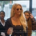 Emma’s navy square neck top and mini skirt on Selling Sunset