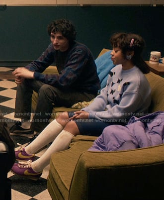 Erica’s blue dog print sweater and lilac jacket on Stranger Things