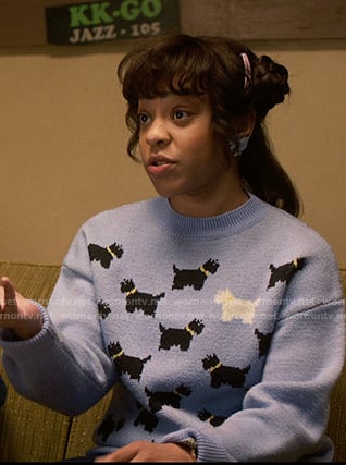 Erica's blue dog print sweater and lilac jacket on Stranger Things