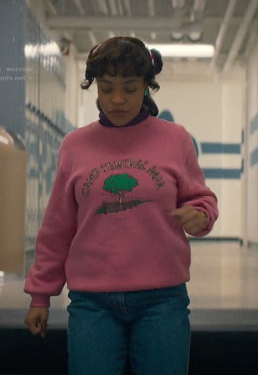 Erica's pink print sweatshirt and purple sneakers on Stranger Things