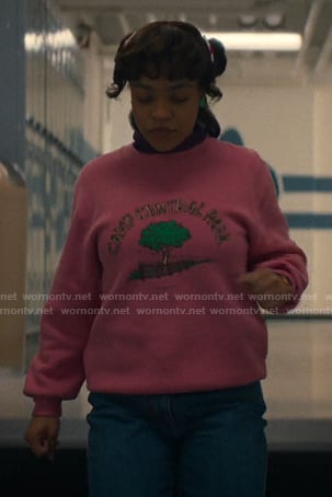 Erica's pink print sweatshirt and purple sneakers on Stranger Things