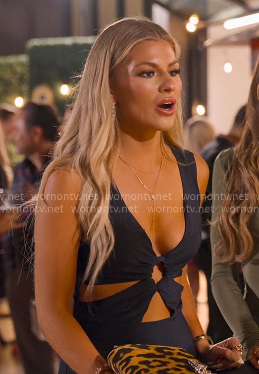 Fiona's navy dress with cutouts on Selling the OC