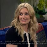 Gemma’s black and white short-sleeve cardigan on The Neighborhood