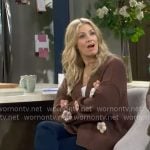 Gemma’s brown flower cardigan on The Neighborhood