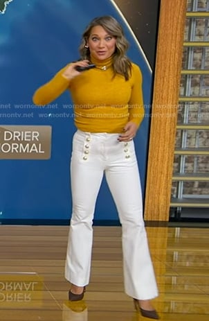 Ginger’s yellow turtleneck and white flare pants on Good Morning America