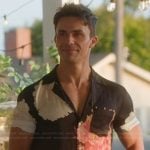 Gio’s black floral print shirt on Selling the OC