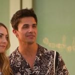Gio’s black tropical print shirt on Selling the OC