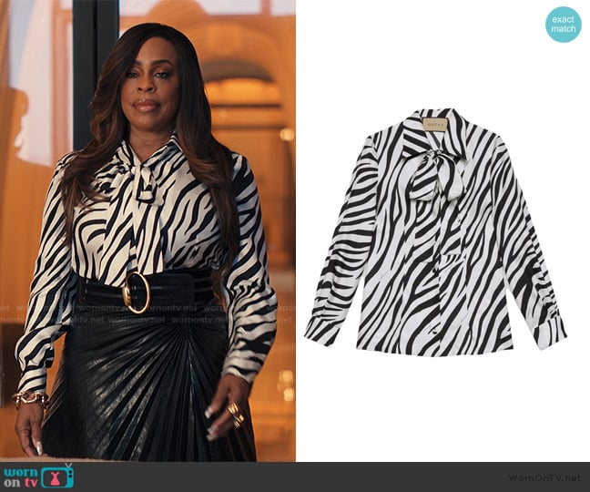 Gucci Zebra Stripe Tie Neck Blouse worn by Emerald Greene (Niecy Nash-Betts) on Alls Fair