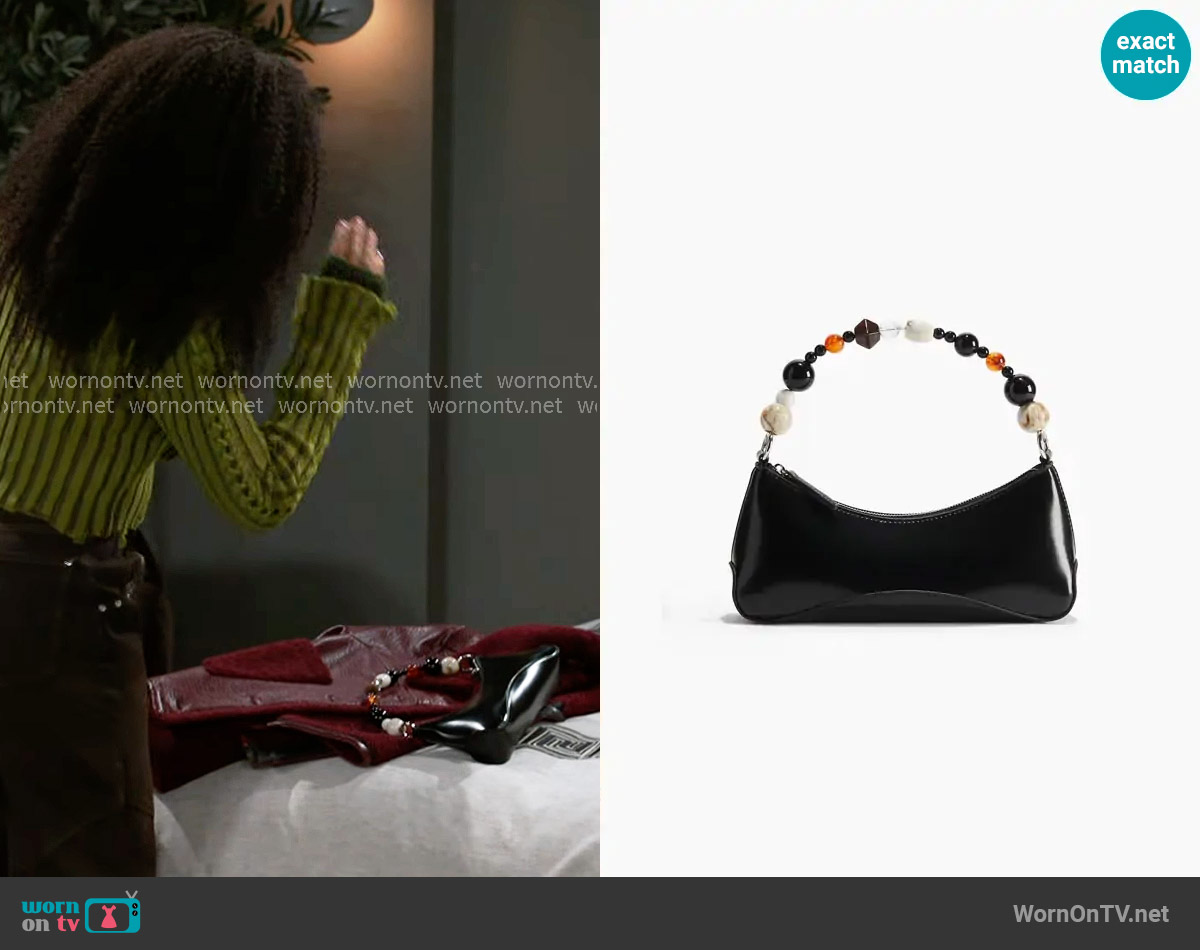 H&M Beaded-Strap Shoulder Bag worn by Eva Thomas (Ambyr Michelle) on Beyond the Gates
