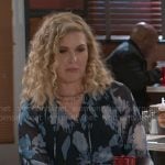 Jan’s blue floral dress on Beyond the Gates