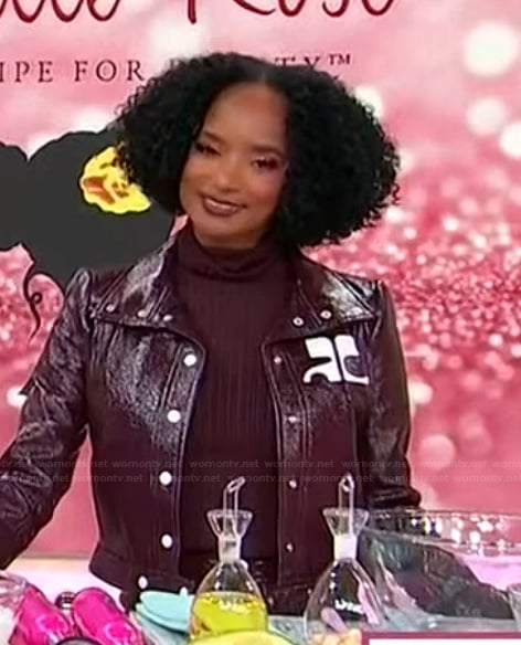 Janell Stephens’s burgundy leather jacket and mini skirt on Sherri