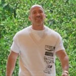 Jason’s white printed vest on Selling Sunset