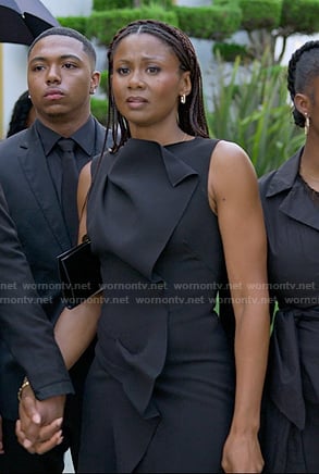 Jax’s black sleeveless ruffle dress on Reasonable Doubt