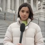 Julie's cream white puffer jacket on NBC News Daily