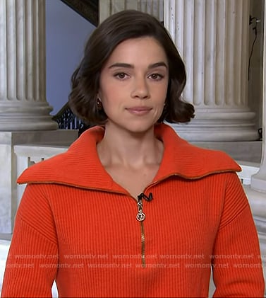 Julie's red ribbed half-zip sweater on NBC News Daily