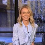 Kelly’s blue tie neck blouse on Live with Kelly and Mark