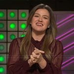 Kelly’s burgundy sheer blouse and pants on The Kelly Clarkson Show