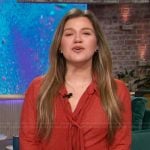 Kelly’s red printed tie neck blouse on The Kelly Clarkson Show