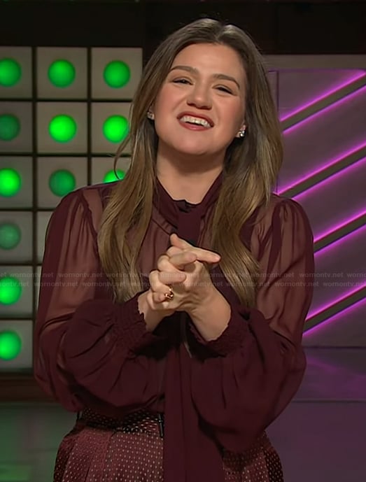 Kelly's burgundy sheer blouse and pants on The Kelly Clarkson Show