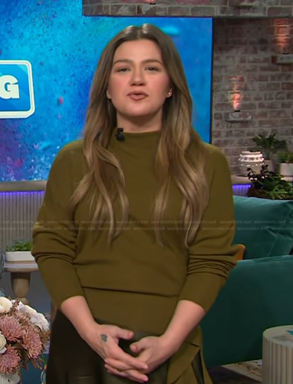 Kelly's green asymmetric sweater on The Kelly Clarkson Show