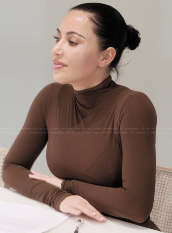 Kim's brown mesh top on The Kardashians