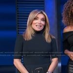 Kit’s navy belted mini skirt on Access Hollywood