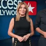 Kit’s black pants with gold buttons on Access Hollywood