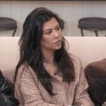 Kourtney’s brown check print top on The Kardashians