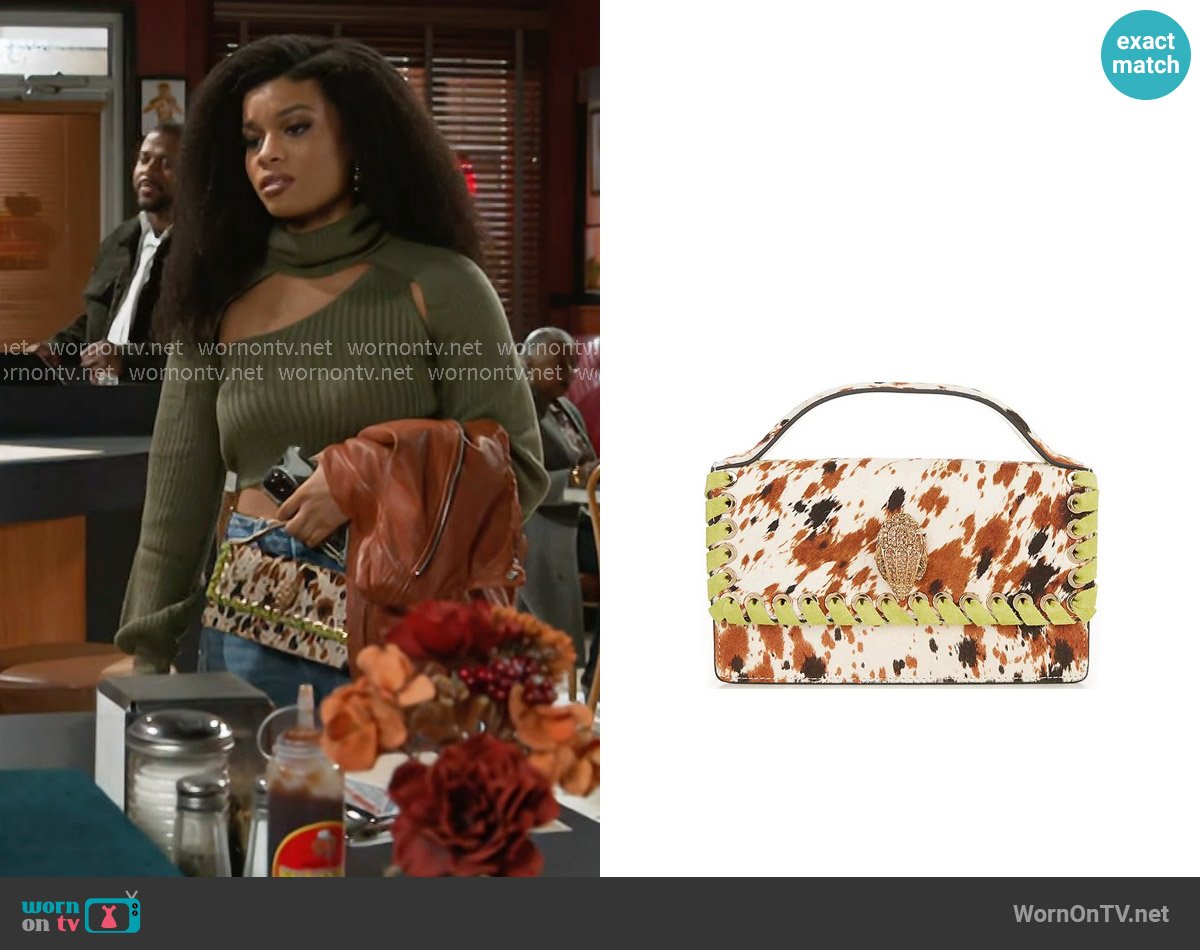 Kurt Geiger Small Bond Top Handle Cow Print Haircalf Satchel Bag worn by Eva Thomas (Ambyr Michelle) on Beyond the Gates