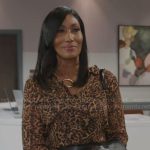 Leslie’s leopard print shirt on Beyond the Gates