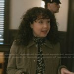 Marissa’s abstract print top and green suede jacket on Elsbeth