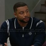 Martin’s navy blue sweatshirt with stripes on Beyond the Gates