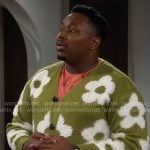 Marty’s green flower cardigan and pink cactus print t-shirt on The Neighborhood