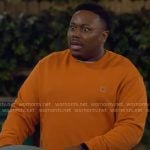 Marty’s orange sweatshirt on The Neighborhood